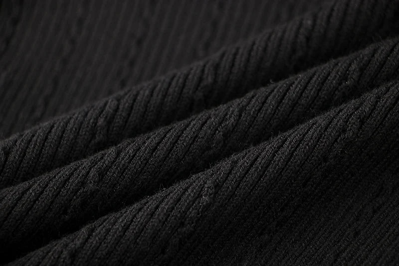 Top Sia in lana a maniche lunghe in nero