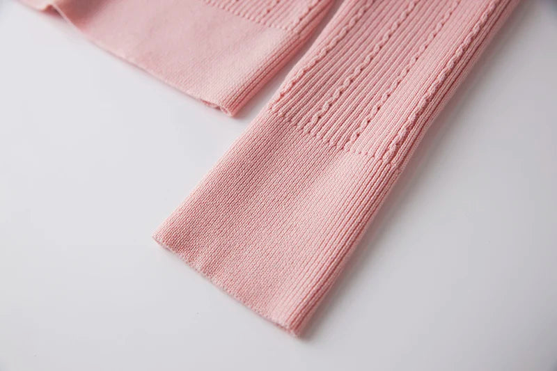 Top Sia in lana a maniche lunghe in rosa