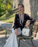 BLAZER CRUZADO EN NEGRO CON strass 